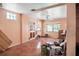Spacious living room with tile floors, large windows, and potential for customization at 100 94Th Ave, Treasure Island, FL 33706