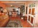 Cozy living room features an open floor plan, comfortable seating, and access to the kitchen at 100 94Th Ave, Treasure Island, FL 33706