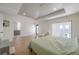 Large bright bedroom with view of water. En-suite bathroom at 11313 Knights Griffin Rd, Thonotosassa, FL 33592