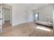 Spacious bedroom features wood floors, recessed lights, and double closets at 11313 Knights Griffin Rd, Thonotosassa, FL 33592