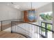 Bright entryway with custom blue glass chandelier, staircase and view to outdoors at 11313 Knights Griffin Rd, Thonotosassa, FL 33592