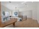 Second floor foyer with views to the outside and artistic chandelier at 11313 Knights Griffin Rd, Thonotosassa, FL 33592