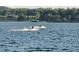 People enjoying jetskis on the lake at 11313 Knights Griffin Rd, Thonotosassa, FL 33592