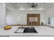 Kitchen featuring an island with sink and view into open-concept living space at 1213 E Lemon St, Tarpon Springs, FL 34689