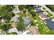 Aerial view of the property showing the home, lot, mature trees, and surrounding neighborhood at 1237 Oak Valley Dr, Seffner, FL 33584