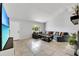 Living room featuring neutral paint, tile flooring, and comfortable sectional sofa at 1237 Oak Valley Dr, Seffner, FL 33584