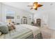 Cozy bedroom with lots of natural light at 1237 Windy Bay Shl, Tarpon Springs, FL 34689