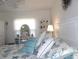 Bright bedroom with coordinated bedding and white furniture at 1250 S Pinellas Ave # 1013, Tarpon Springs, FL 34689