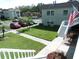 Elevated exterior shot of a building, parking area, and manicured lawns at 1250 S Pinellas Ave # 1013, Tarpon Springs, FL 34689