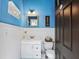 Charming bathroom with wainscoting, stylish mirror, and adorable star accents at 126 Holly Tree Ln, Brandon, FL 33511