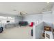Upstairs bonus room with neutral carpet, a ceiling fan and a comfortable sitting area at 12801 Stanwyck Cir, Tampa, FL 33626