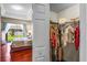 Well-organized walk-in closet adjacent to the main bedroom with ample storage space at 12801 Stanwyck Cir, Tampa, FL 33626