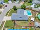 Aerial view of home with a pool and a well-maintained yard on a quiet cul-de-sac at 12879 112Th St, Largo, FL 33778