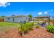 Outdoor patio with a pergola and backyard pool, offering a relaxing space for entertaining at 12879 112Th St, Largo, FL 33778