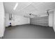 Spacious two car garage with painted floors and walls, and automatic door at 12879 112Th St, Largo, FL 33778