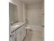 Bathroom with a granite vanity, and a shower-tub combo at 13334 Ogden Glade Rd, Dade City, FL 33525