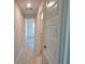 Hallway with view into other rooms at 13334 Ogden Glade Rd, Dade City, FL 33525