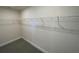 Spacious walk-in closet with rod and shelf at 13374 Ogden Glade Rd, Dade City, FL 33525