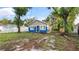 Exterior of a quaint single-story home with fresh paint and well-kept yard at 1513 W Mohawk Ave, Tampa, FL 33603