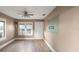 Cozy living room featuring sleek hardwood flooring and neutral paint at 1513 W Mohawk Ave, Tampa, FL 33603