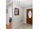 Inviting foyer showcasing a beautiful front door and tile flooring at 1667 E Orangeside Rd, Palm Harbor, FL 34683