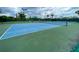 Well-maintained community tennis court with blue and green surfacing at 18930 Wood Sage Dr, Tampa, FL 33647
