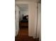 Bedroom featuring hardwood floors and a cozy bed adorned with teddy bears at 2108 W Comanche Ave, Tampa, FL 33603