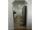 View of the kitchen with stainless steel refrigerator and ample storage space at 2108 W Comanche Ave, Tampa, FL 33603