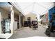 Spacious outdoor patio area for recreation and relaxation featuring exercise equipment and ample open space at 2108 W Comanche Ave, Tampa, FL 33603