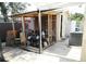Shed with storage for outdoor equipment including lumber, wheelbarrow, toy car and tools at 2108 W Comanche Ave, Tampa, FL 33603