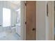 Cozy bathroom featuring a vanity, toilet, and window at 2406 Dana Dr, Safety Harbor, FL 34695