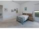 Comfortable bedroom with natural light, closet, and simple decor at 2406 Dana Dr, Safety Harbor, FL 34695