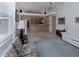 Bright open-plan living room showcasing modern decor and abundant natural light at 2406 Dana Dr, Safety Harbor, FL 34695