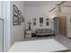 Bright living room space with large window and simple furniture at 2406 Dana Dr, Safety Harbor, FL 34695