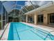 Beautiful screened-in pool and patio, a great space for outdoor entertaining and relaxation at 2406 Dana Dr, Safety Harbor, FL 34695