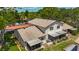 Aerial view showcasing the property's screened-in porches and well-maintained landscaping at 2442 Enterprise Rd # 6, Clearwater, FL 33763