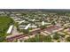 An aerial view shows proximity to amenities, the layout, and community landscaping at 2442 Enterprise Rd # 6, Clearwater, FL 33763