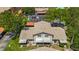 Aerial view of the neighborhood homes, parking, and landscape at 2442 Enterprise Rd # 6, Clearwater, FL 33763