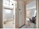 This bathroom is situated between a hallway and a bedroom offering easy access and convenience at 2817 Rustic Oaks Dr, Palm Harbor, FL 34684