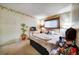 A bedroom is shown with a floral theme and plant accent offering a soothing and personal space at 2817 Rustic Oaks Dr, Palm Harbor, FL 34684