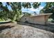 Spacious home exterior featuring a well-maintained lawn and mature landscaping, offering privacy and curb appeal at 2817 Rustic Oaks Dr, Palm Harbor, FL 34684