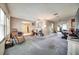 Generously sized living area with neutral walls, ample space for furnishings, and doorway views into other areas at 2817 Rustic Oaks Dr, Palm Harbor, FL 34684