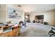 Comfortable living room with a cozy atmosphere, featuring a large TV and plenty of space for relaxation and entertainment at 2817 Rustic Oaks Dr, Palm Harbor, FL 34684