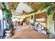 This sunroom has decor and plants to offer a sun-kissed retreat inside this home at 2817 Rustic Oaks Dr, Palm Harbor, FL 34684