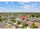 Aerial view highlighting property location within a lush, planned community at 3013 Silvermill Loop # O, Land O Lakes, FL 34638