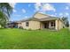 Beautiful backyard with patio seating provides a relaxing outdoor living area at 3013 Silvermill Loop # O, Land O Lakes, FL 34638