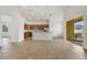 Spacious living room with open kitchen concept and breakfast bar at 3013 Silvermill Loop # O, Land O Lakes, FL 34638