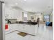 Bright, open kitchen featuring granite countertops, stainless appliances, and an open floorplan at 30247 Emmetts Ct, Wesley Chapel, FL 33543