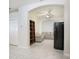 Inviting living area with tile flooring, neutral decor, and a spacious layout at 30247 Emmetts Ct, Wesley Chapel, FL 33543