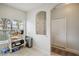 Cozy breakfast nook with a view of the neighborhood, storage shelves, and access to closet space at 30352 Elderwood Dr, Wesley Chapel, FL 33543